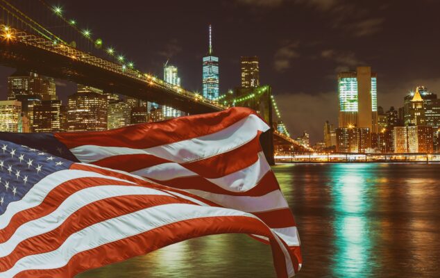 close up of the brooklyn bridge with u s flag at 2022 11 12 10 55 00 utc scaled